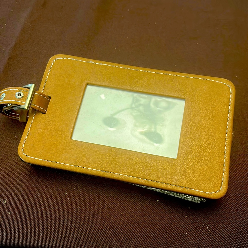 Luggage label photo album - holds 100 6x4 photos